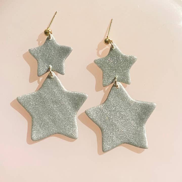 silver star dangles for wholesale by The Color Theory