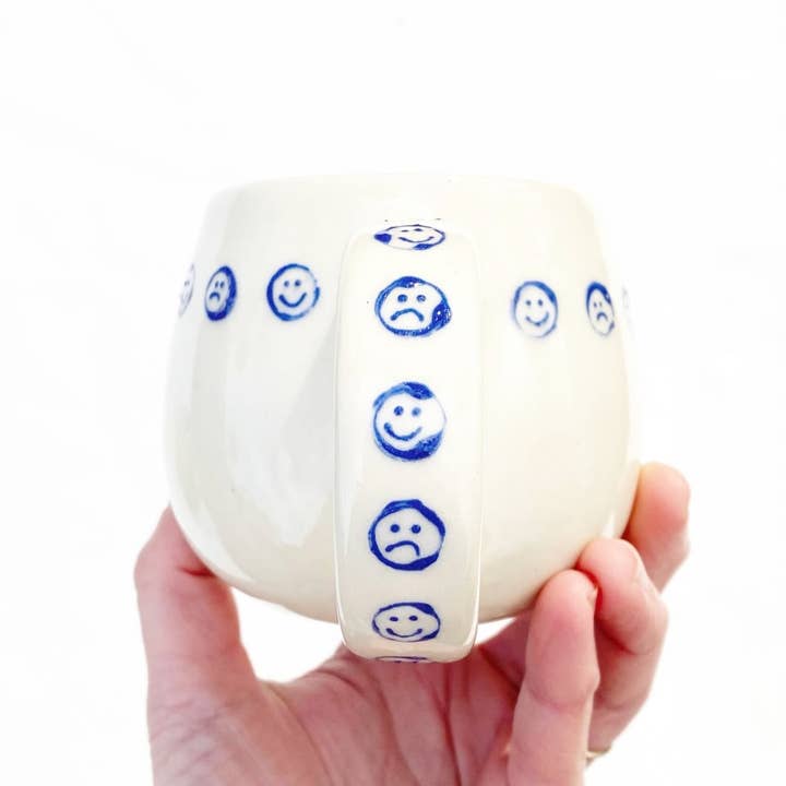 Korai Goods - Wholesale Coffee Mug - The Feelings Mug - Happy / Sad Face Design