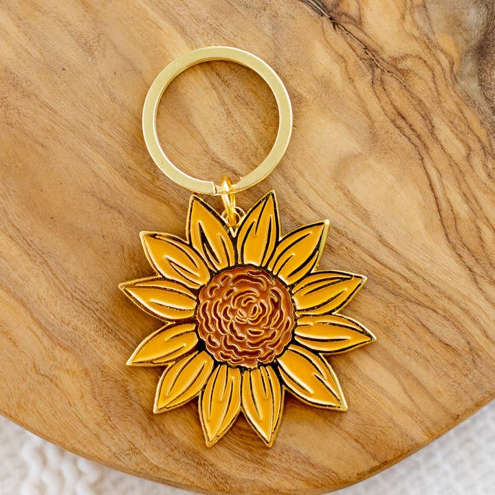 Sunflower Field Metal Keychain, 2x2 in. and other Purchase Wholesale sunflower keychain. Free Returns & Net 60 Terms on Faire trending on Faire.