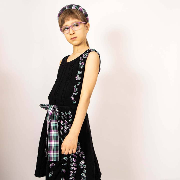 Infantium Victoria – wholesale Dress – Kids – Black Cable Knit Dress with Purple Tartan Details1