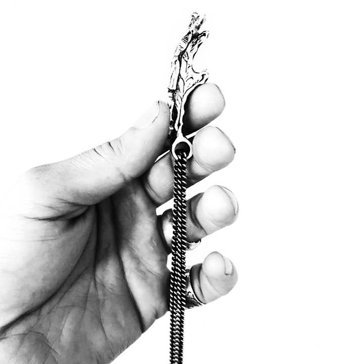 FILIGREE MADONNA CRUCIFIX SKULL BOTTLE OPENER WITH CHAIN for wholesale by Brooklyn Smithy