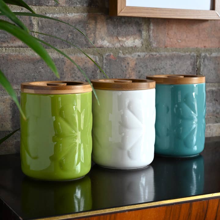 Carnaby Porcelain Embossed Jar Ivory with Bamboo Lid for wholesale by Navigate Ltd