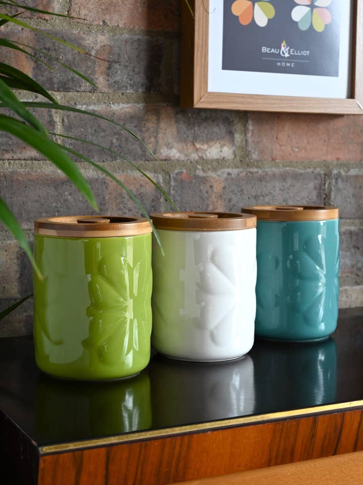 Carnaby Porcelain Embossed Jar Ivory with Bamboo Lid for wholesale by Navigate Ltd