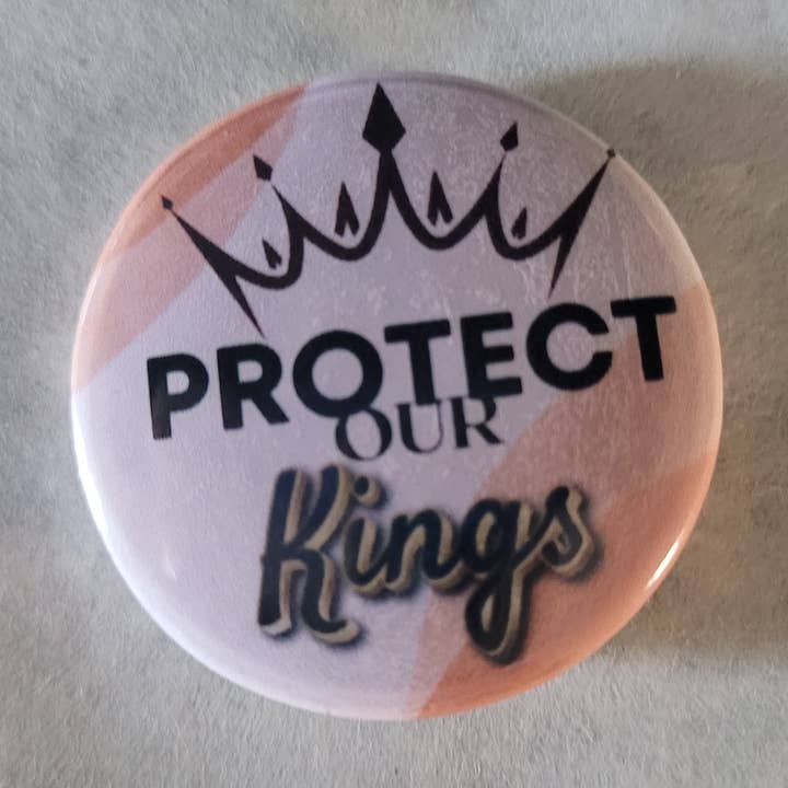 Protect Our Kings Button Pin for wholesale by Self Care Tribe