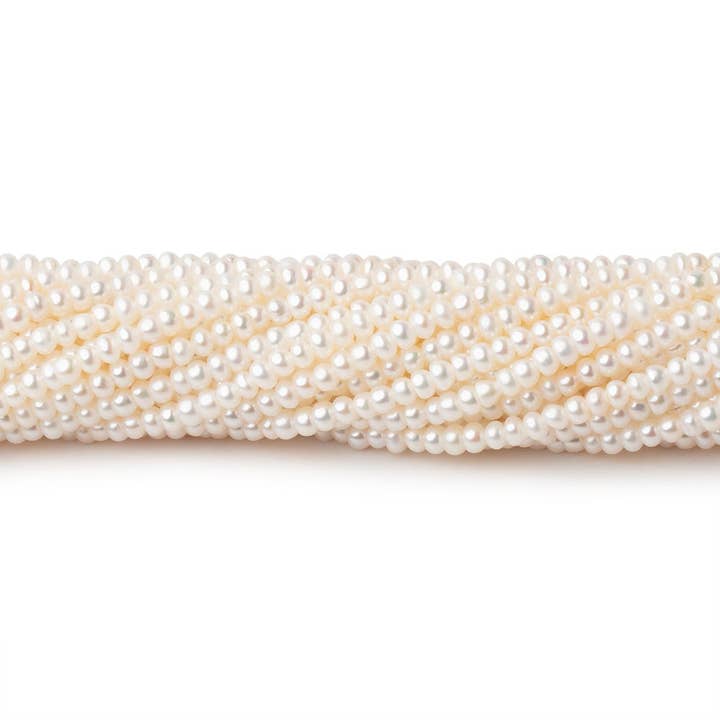 2,5 mm cremet hvide uregelmæssige ferskvandsperler 15,5 tommer 190 perler for engroshandel hos Beads of Cambay