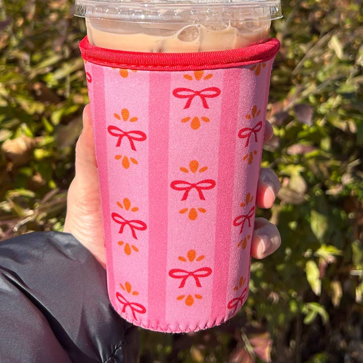 Festive Bows and Stripes Pink Iced Coffee Drink Sleeve for wholesale by Sun and Mind Co.