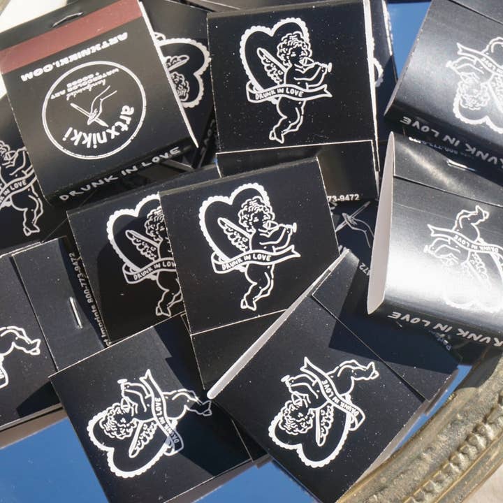 artxnikki - Wholesale Matches - “Drunk In Love” Cupid Champagne Matchbook
