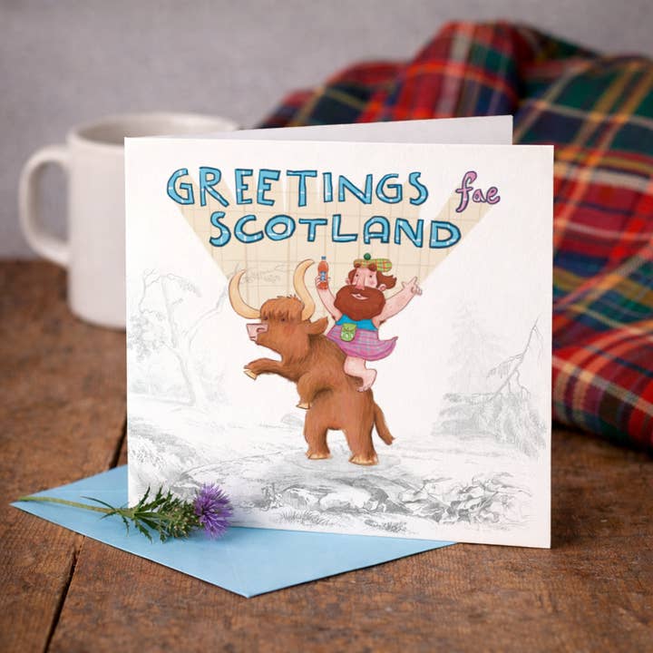 Greetings fae Scotland - Highland Cow Scottish Greeting Card for wholesale by The Grey Earl