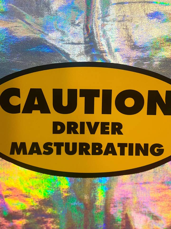 Caution Driver Masturbating Oval Sticker for wholesale by MP Bag Makers