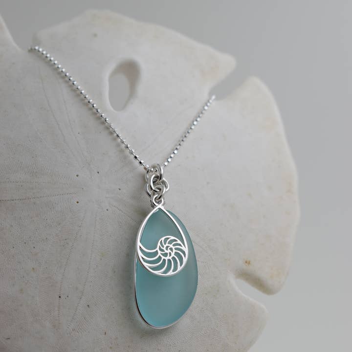 Eco Sea Glass pendant with silver Nautilus charm for wholesale by Whitelotus Design