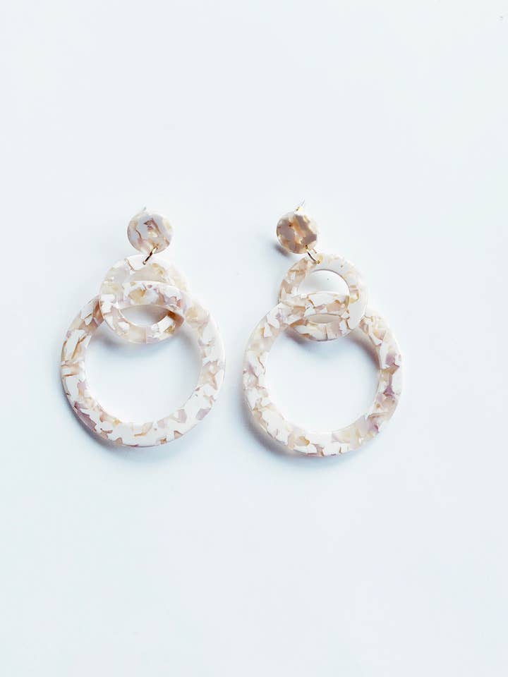 THE INTERLOCKING CIRCLES for wholesale by Modafleur