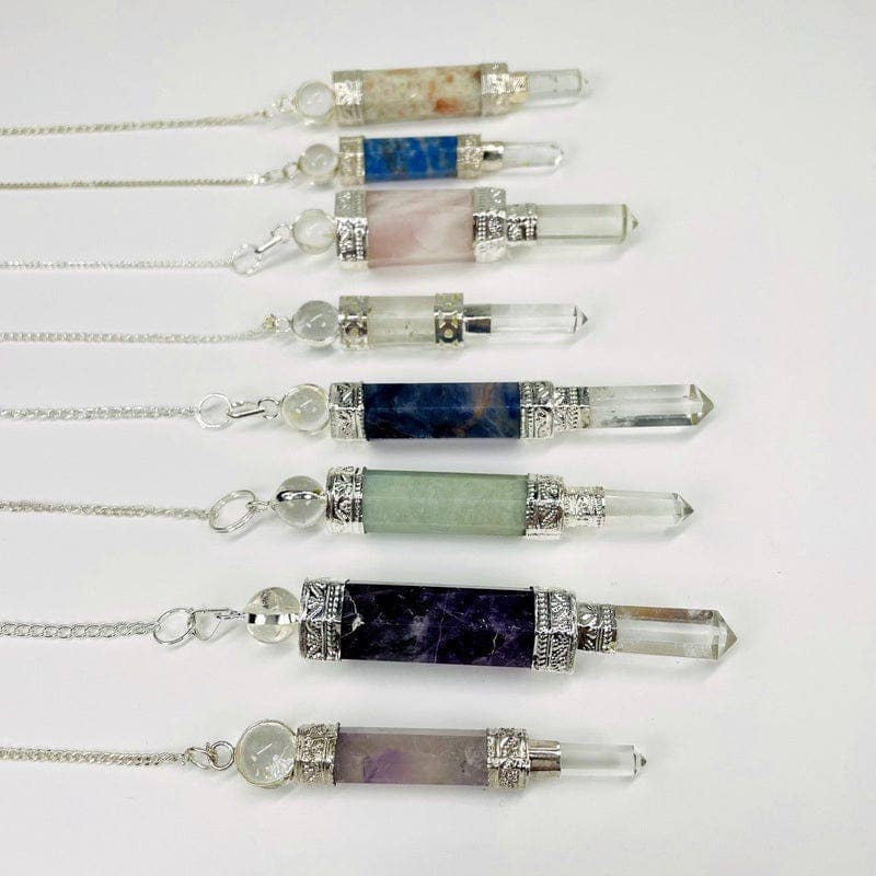 Rock Paradise – wholesale Meditation supplies – Crystal Quartz Point Pendulum with Silver toned Chain8