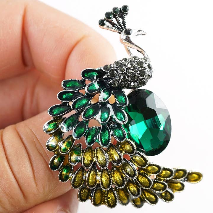 Elegant Crystal Peacock Brooch – Green & Gold Statement Pin and other Purchase Wholesale peacock ore. Free Returns & Net 60 Terms on Faire trending on Faire.