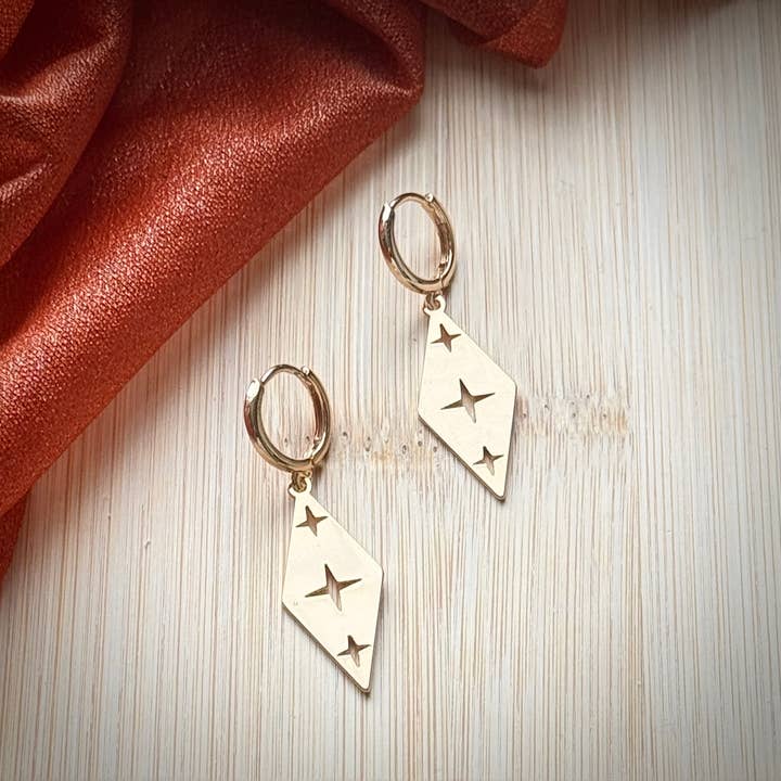 18k Gold Starburst Huggie Hoops for wholesale by Monstera Earrings