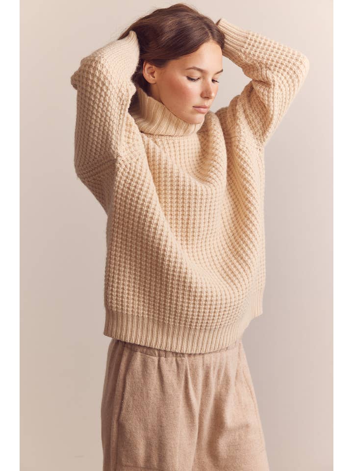 Cream Wool turtleneck waffle sweater for wholesale on Faire
