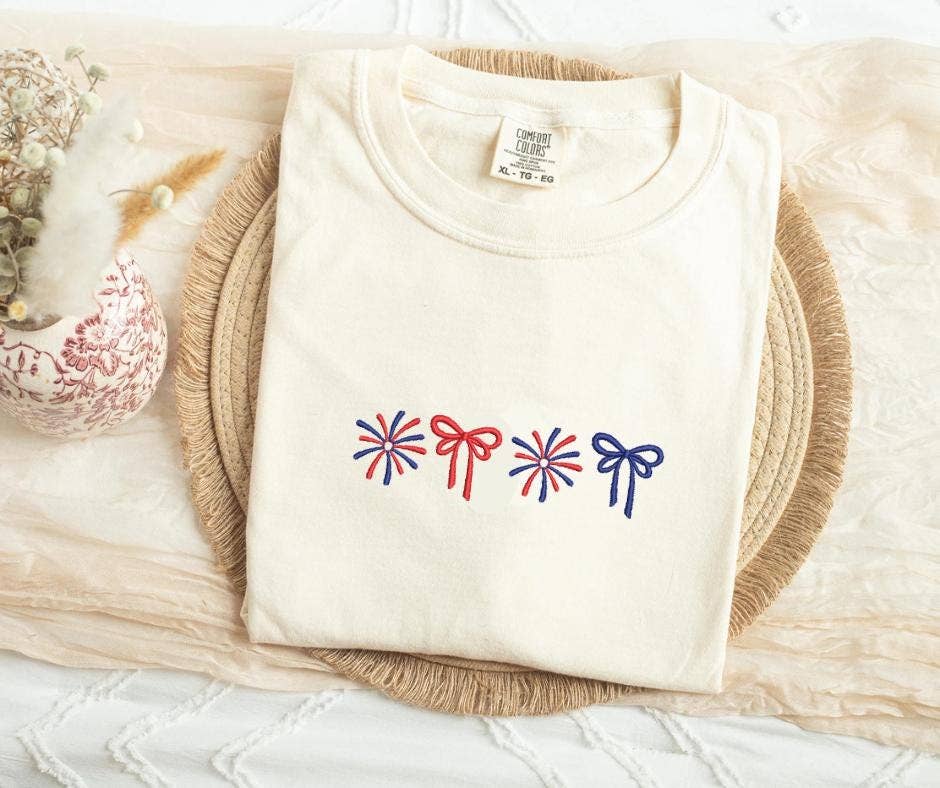ART OF DOTS - Wholesale T-Shirt - Women's - Coquette Bow American Flag Embroidered Patriotic Tee