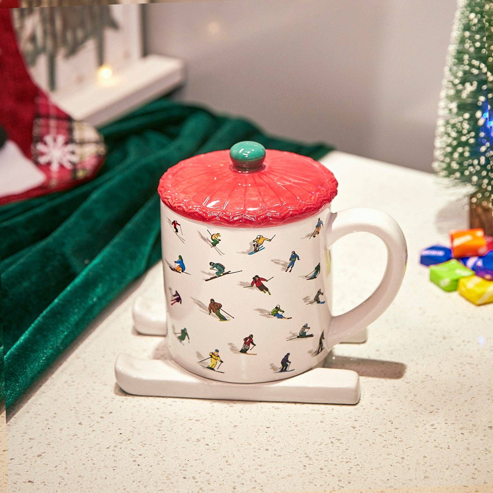 The Wine Savant /  Khen Glassware - Wholesale Coffee Mug - Ceramic Skiing Mug with Lid and Skis Coaster by GUTE - Cute4