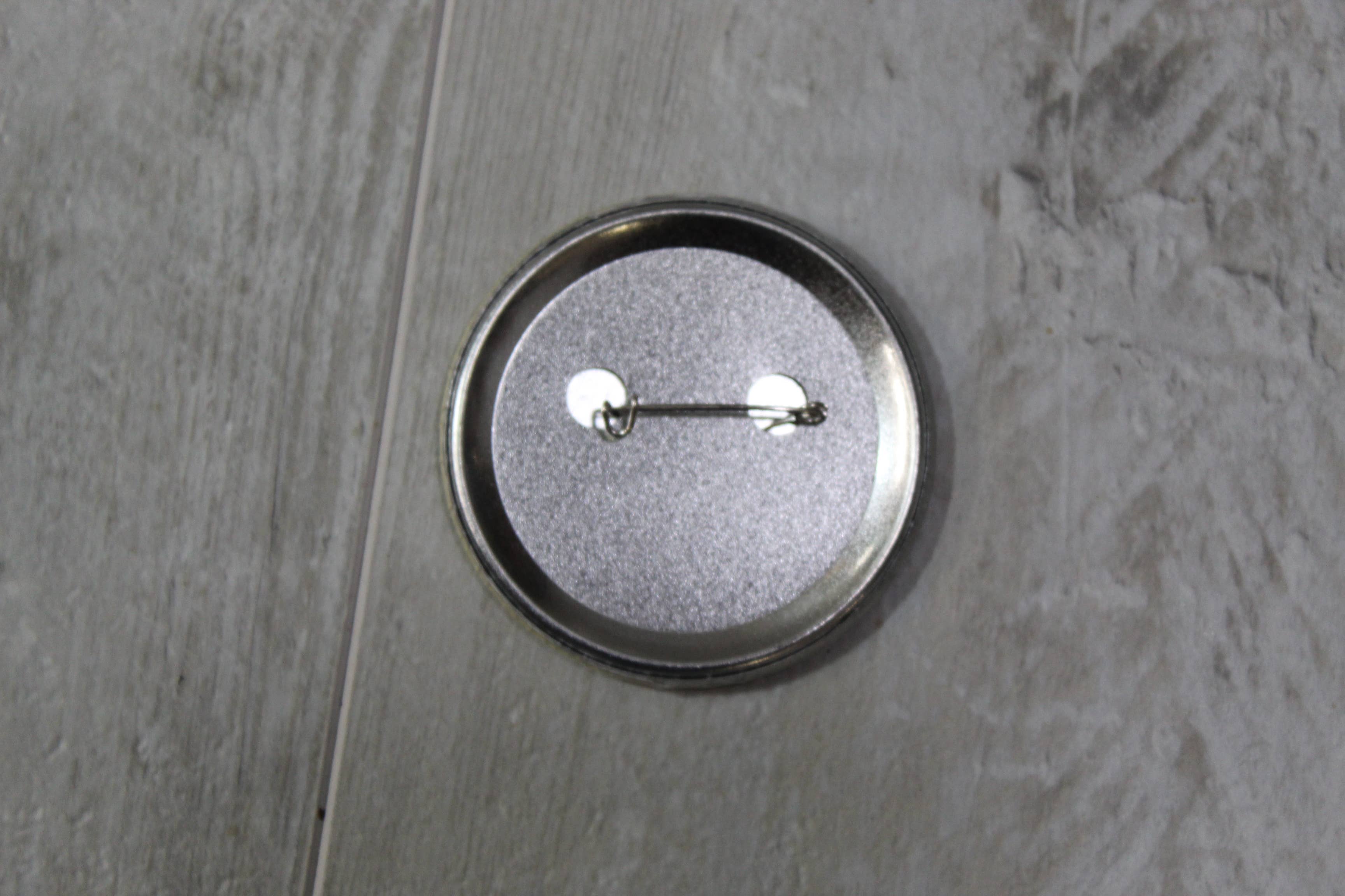 Raven Design - Wholesale Lapel Pin/Button - 1980's cartoon bad guys, metal backed button 2.25 inches1