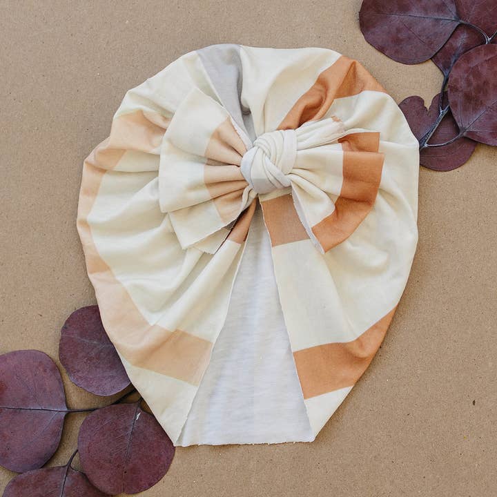 Thick Neutral Stripe Baby Bow Turban for wholesale by Golden Dot Lane