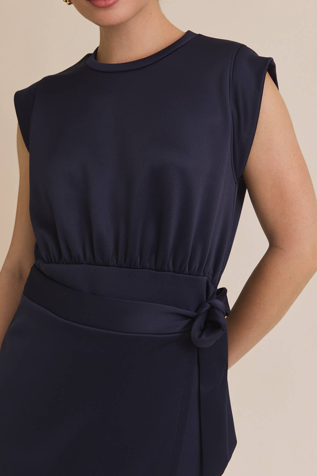 NAVY ROUND NECK SLEEVELESS WRAP MINI DRESS for wholesale on Faire5