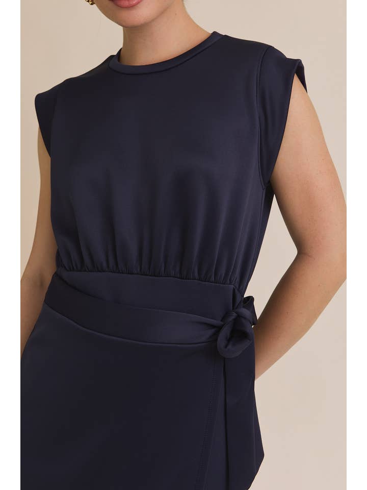 NAVY ROUND NECK SLEEVELESS WRAP MINI DRESS for wholesale on Faire5