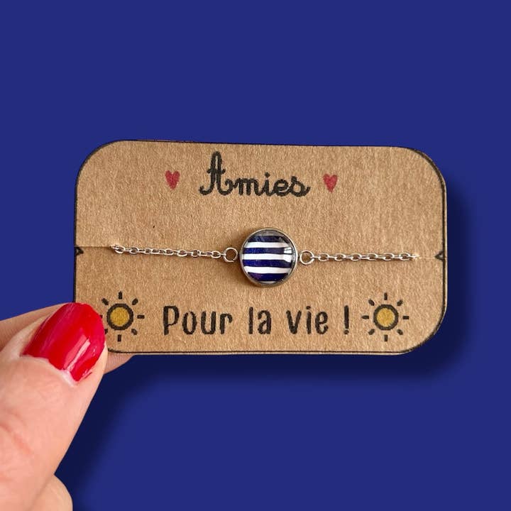 Blue and white striped bracelet, gold or silver finish for wholesale by Dans l'Air du Temps Bijoux