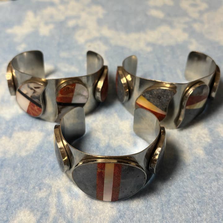 Vintage 1970s Steel Cuff Bracelet Set | Includes 3 Styles with Paisley and Oval Red Coral, Blue Coral, and Mother of Pearl Inlay for wholesale by Whitestone Jewelry Co.
