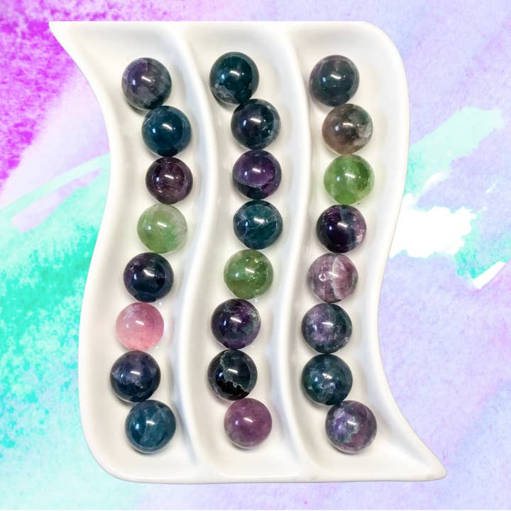 RAINBOW FLUORITE 20mm Gemstone Spheres - Info Card Available for wholesale by Essential Wellness - Body, Mind, Spirit