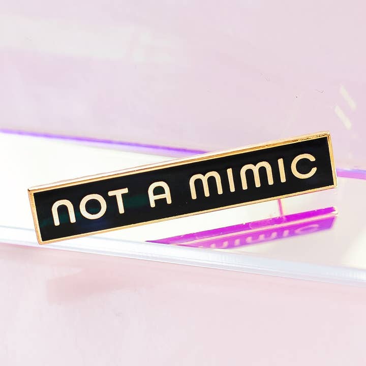 Not A Mimic Pin - Ttrpg for wholesale by Brylliant Design LLC