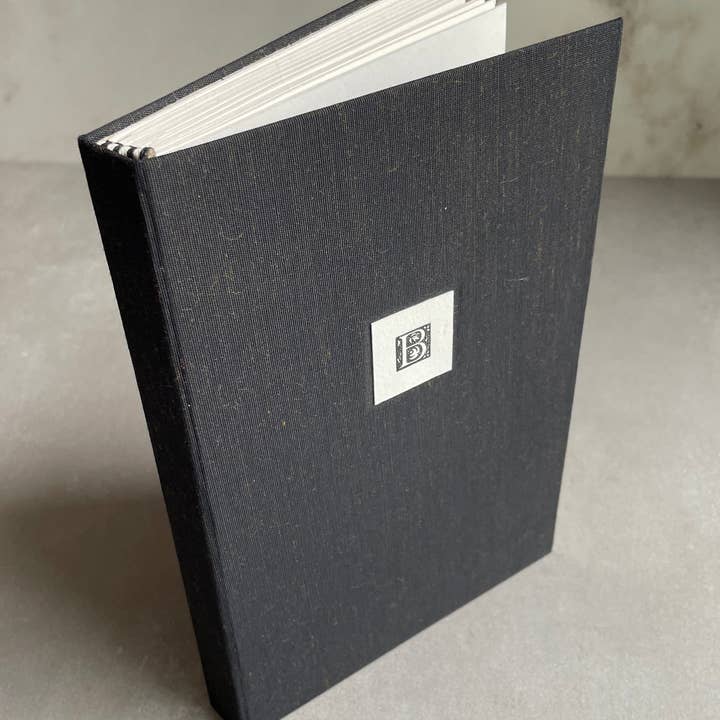 Custom Notebook, Hand bound Journal with Custom Initial. Black Hardcover, unique handmade book. for wholesale by Hearty Greetings