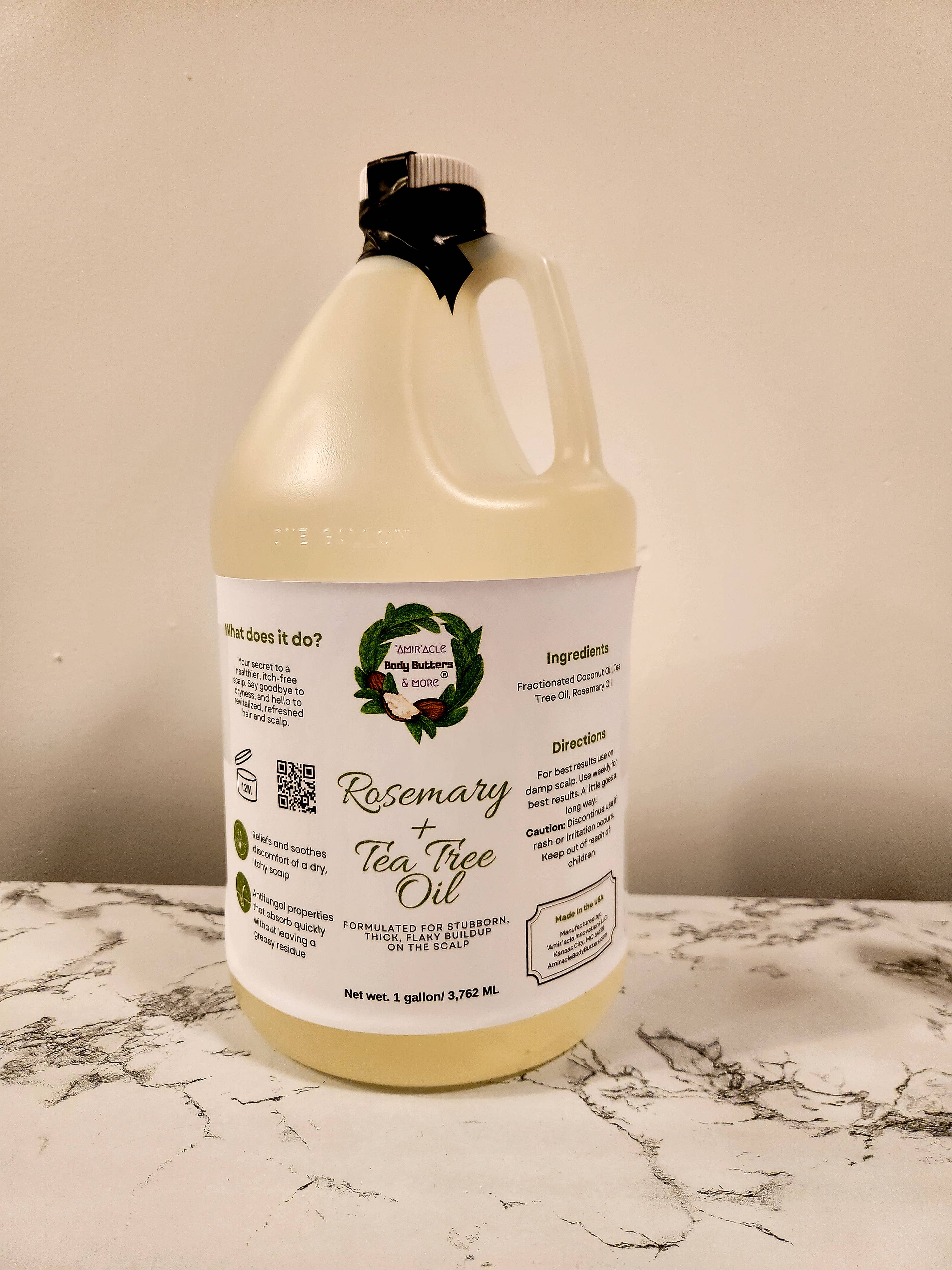 'Amir'acle Body Butters & More - Wholesale Hoofdhuid/haarbehandeling - Gallonformaat Rozemarijn- en Theeboomolie