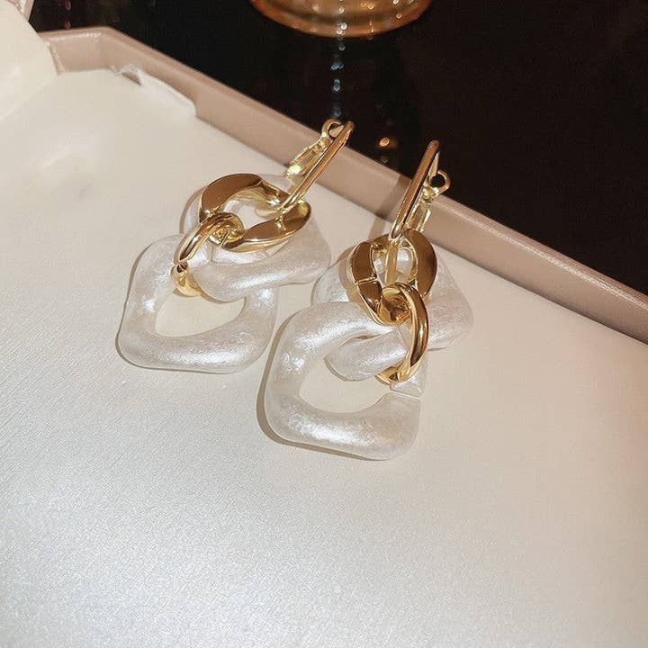 WHITE Acrylic Silver Needle Twist Hoop Earrings for wholesale on Faire3