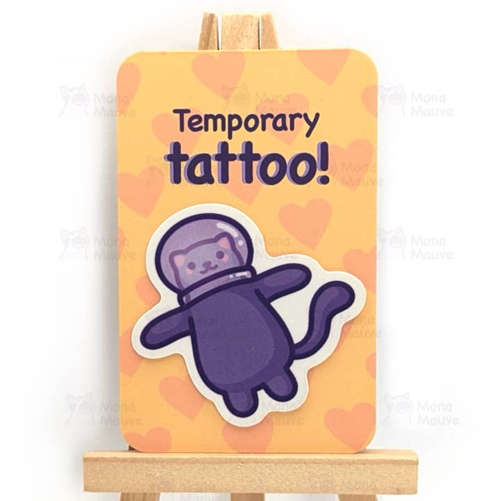 Tatuaggio temporaneo Space Cat per la vendita all'ingrosso da parte di Mona Mauve • Silly Art!