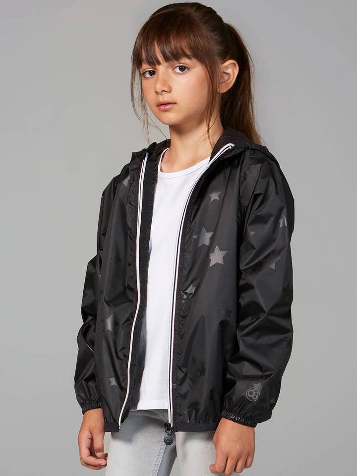 Kids black gloss stars packable rain jacket and windbreaker for wholesale by O8 Lifestyle