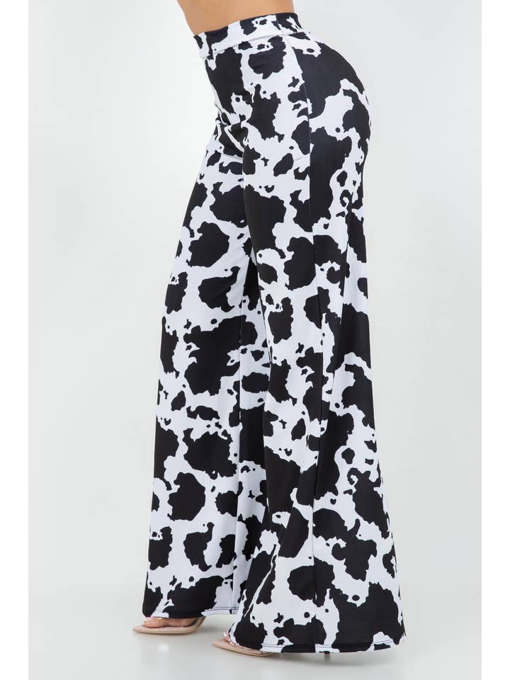 BLACK WHITE B11401 TECHNO CREPE COW PRINT PANTS WITH BACK METAL ZIPPER for wholesale on Faire3