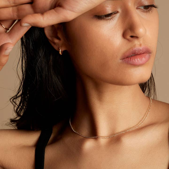 Buvy Jewellery - Wholesale Huggie earrings - 18K Gold Coated Mid Huggie Hoop Earrings2