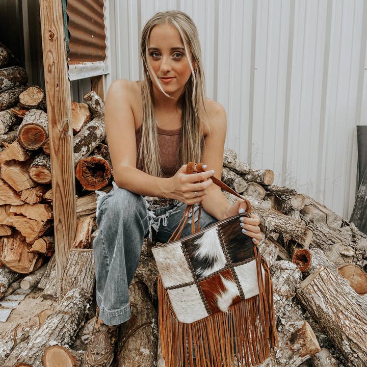 Chesney Patchwork Cowhide Fringe Western Purse and other Purchase Wholesale fringed. Free Returns & Net 60 Terms on Faire trending on Faire.