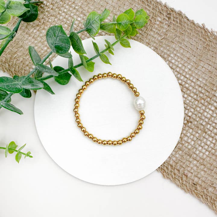 Gold Stainless Steel Bracelet with Large Freshwater Pearl for wholesale by Peach Tree & Co.