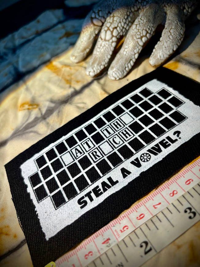 Three Raccoons - Wholesale Patch - Steal A Vowel? Wheel of Fortune style Eat the Rich patch.1