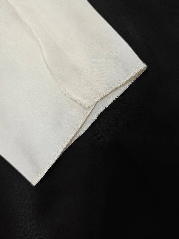 NERO BIANCO Abiti da sera maxi abiti da sera con scollo a V a maniche lunghe in vendita all'ingrosso su Faire12