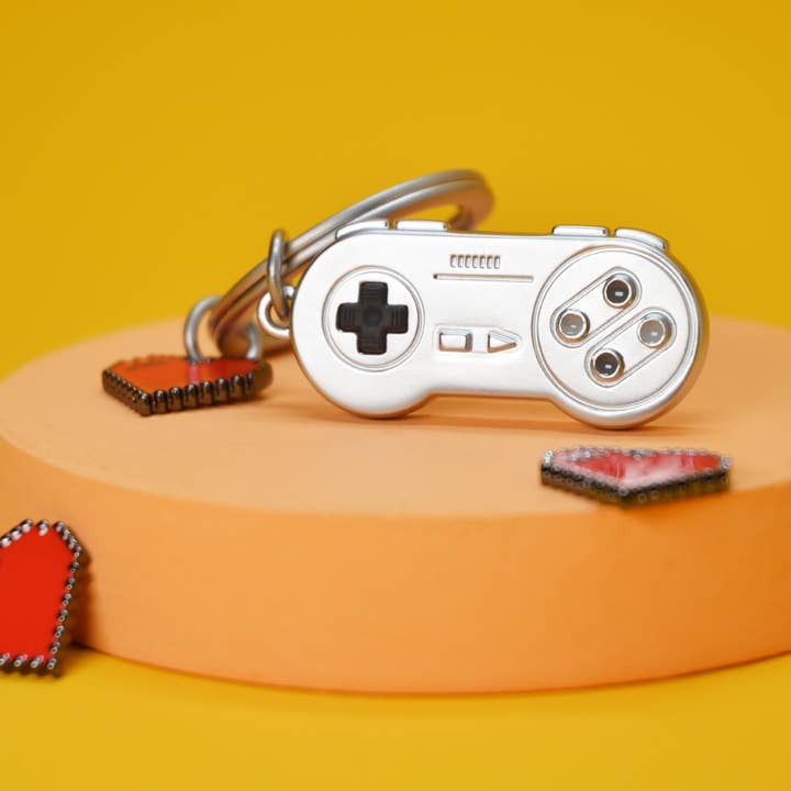 Metalmorphose Chrome Games Controller Keyring for wholesale by Oli Olsen