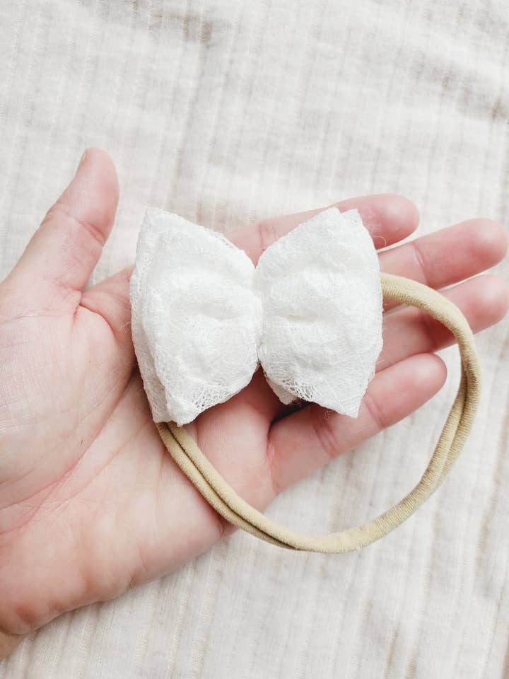 Baby Bow Headband • White Dot for wholesale by Revival Bow Co.