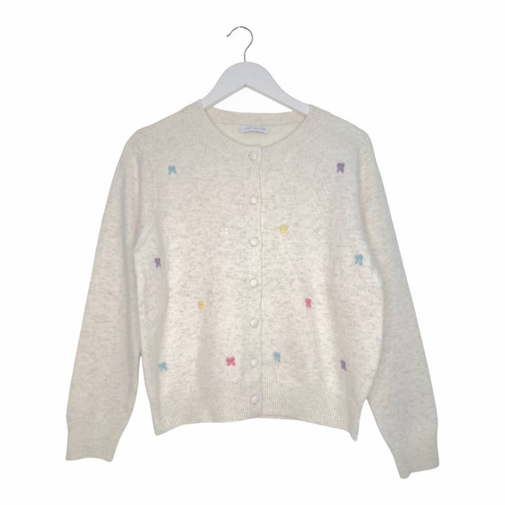 Cardigan en laine mélangée avec nœud brodé en détail, couleur crème pour la vente par Last True Angel