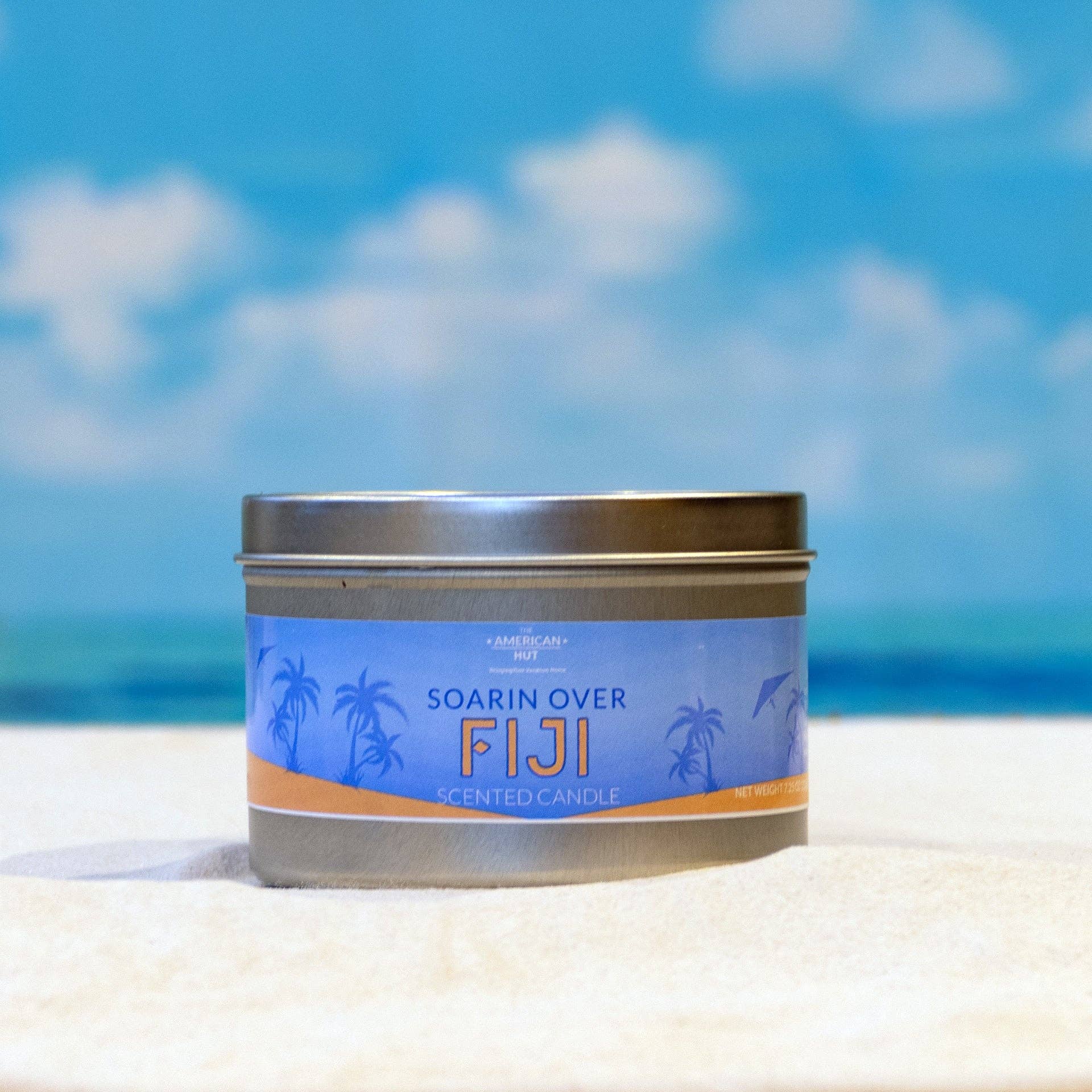 The American Hut - Wholesale Travel Candles - Soarin Over Fiji - Tin Candle with crackling wooden wick
