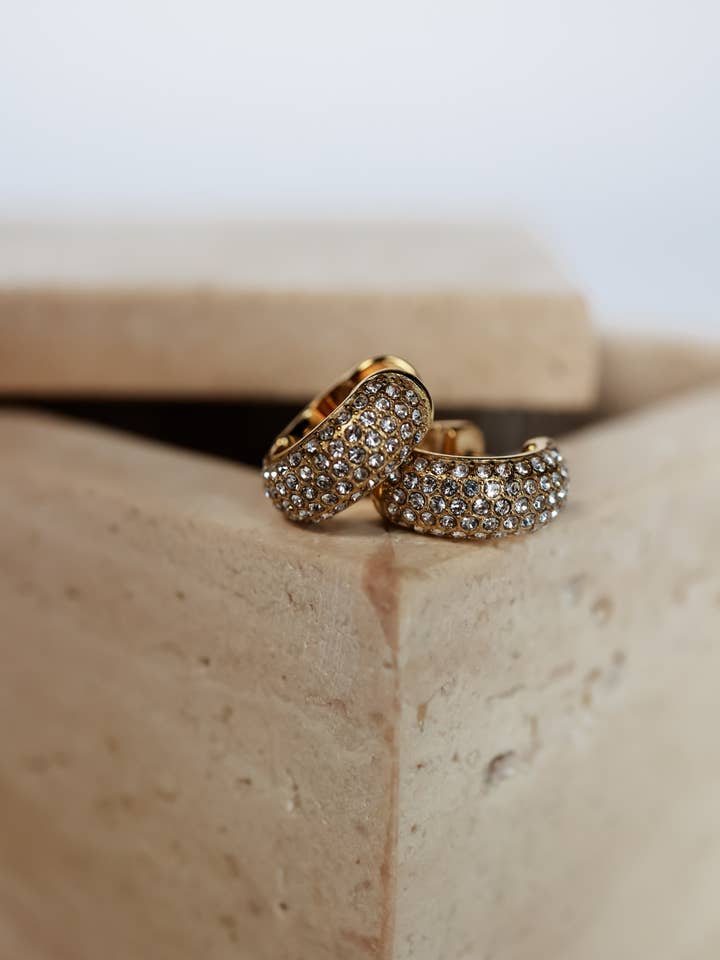 THE SOFT GLOW HUGGIES EARRINGS for wholesale by SHOP HARCO