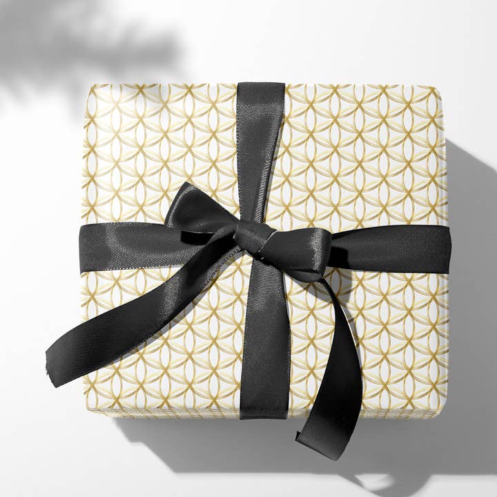 Golden Rings Wrapping Paper for wholesale by Kartoti Designs