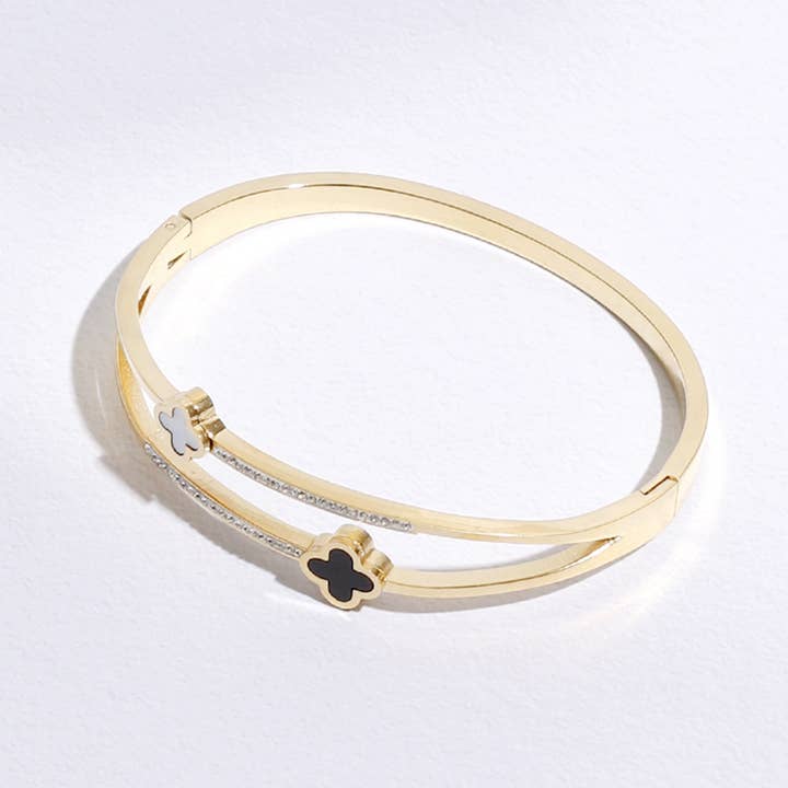 ORO Bracciale rigido placcato in oro bicolore con trifoglio cubico in vendita all'ingrosso su Faire4