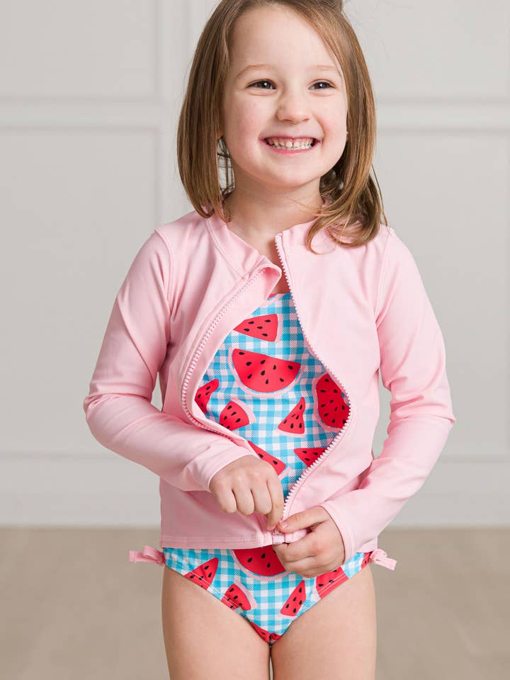 Kids Pink Long Sleeve Full Zip Rash Guard for wholesale on Faire