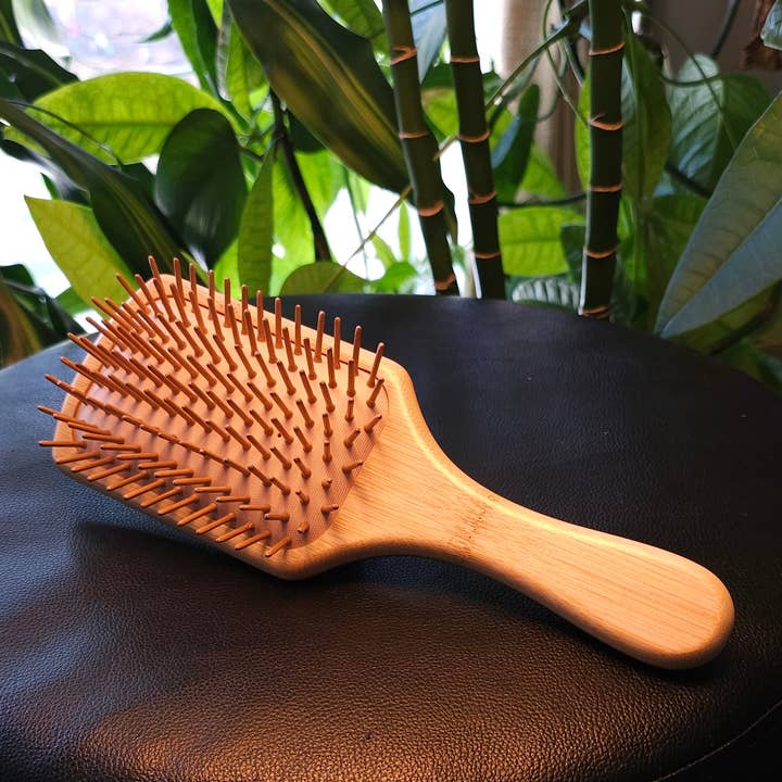 Bamboo Long Paddle Hair Brush for wholesale by CaroQuilla Bamboo Essentials