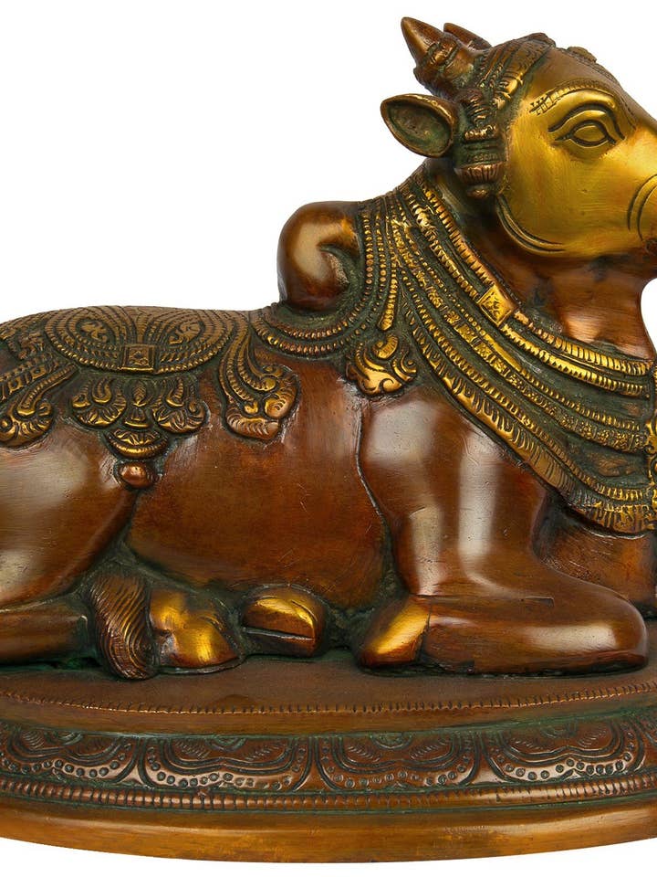 8" Nandi, The Shiva’s Mount and One of His Ganas In Brass for wholesale by Exotic India Art